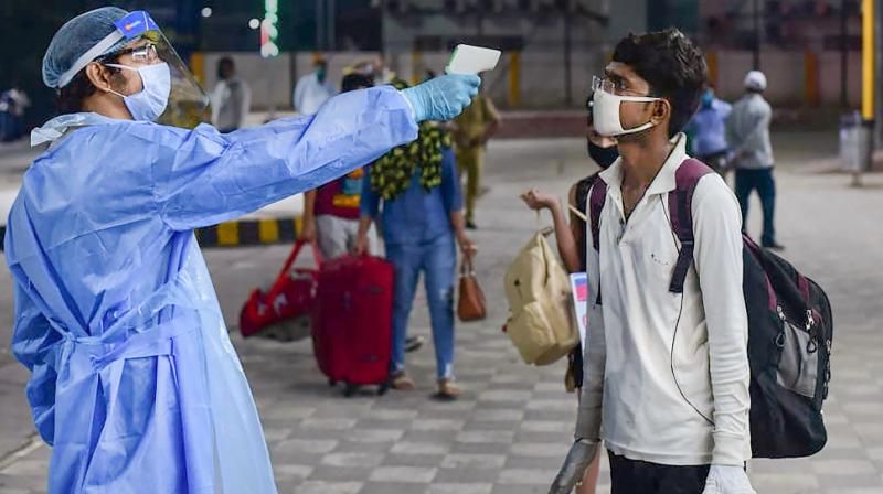 man getting screened by a covid-19 technician., Corona, Corona Update, Covid19 man getting screened by a covid-19 technician., Corona, Corona Update, Covid19